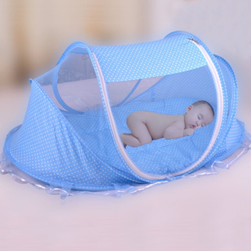 Foldable baby bed net set in blue with a soft pillow, providing a cozy space for infants to sleep safely