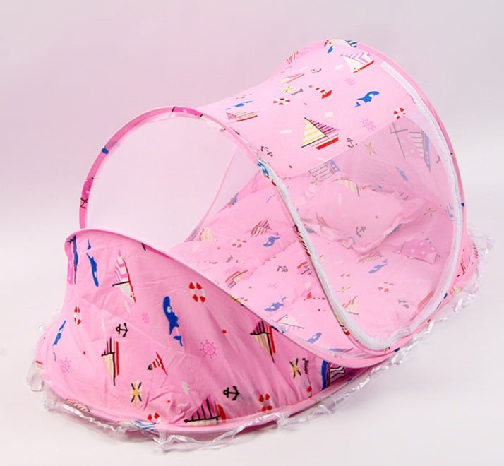 Foldable baby bed net set in pink with playful patterns includes a soft pillow for comfort and protection