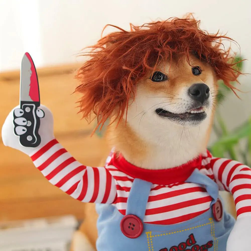 Adorable dog in a funny Halloween pet costume holding a toy knife, featuring a red striped shirt and wild red wig, perfect for funny pet costumes for Halloween