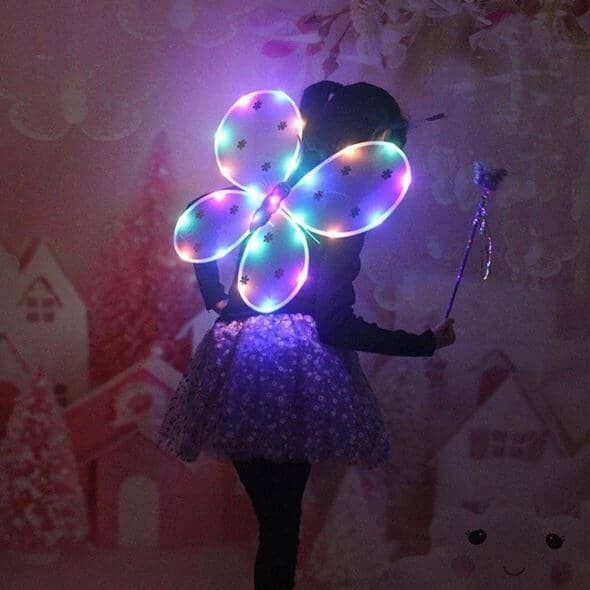 Colorful LED tutu skirt for kids paired with illuminated butterfly wings, creating a magical and enchanting outfit